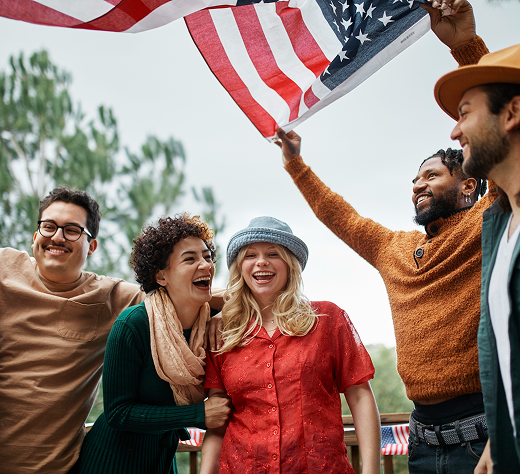 Friends celebrating with an American flag