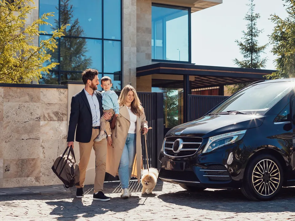 Black sedan ready for airport pickup
