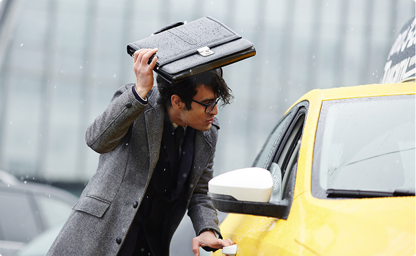 Person hailing a taxi