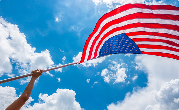 American flag against a blue sky